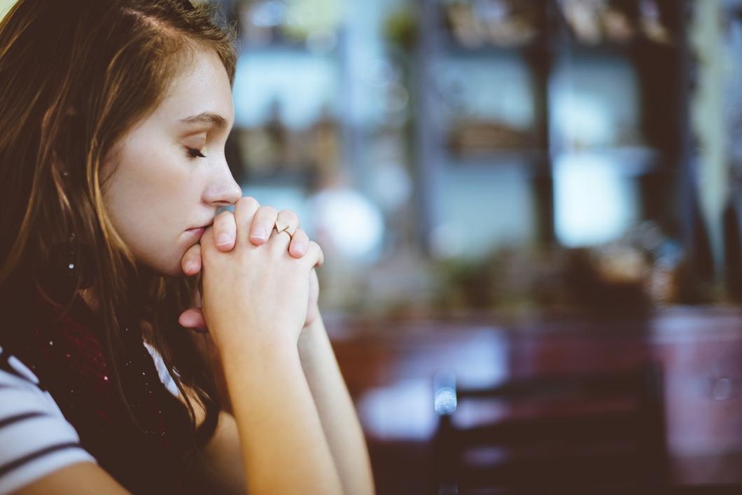 Woman Hands Close-up Praying Blur